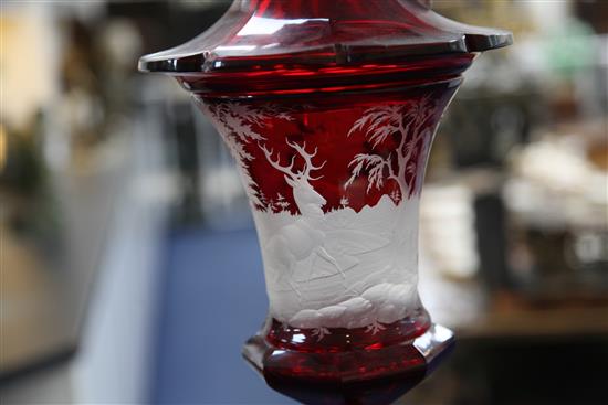 A large Bohemian ruby-stained glass cup and cover, mid 19th century, height 51 cm, finial re-fixed, shallow chips